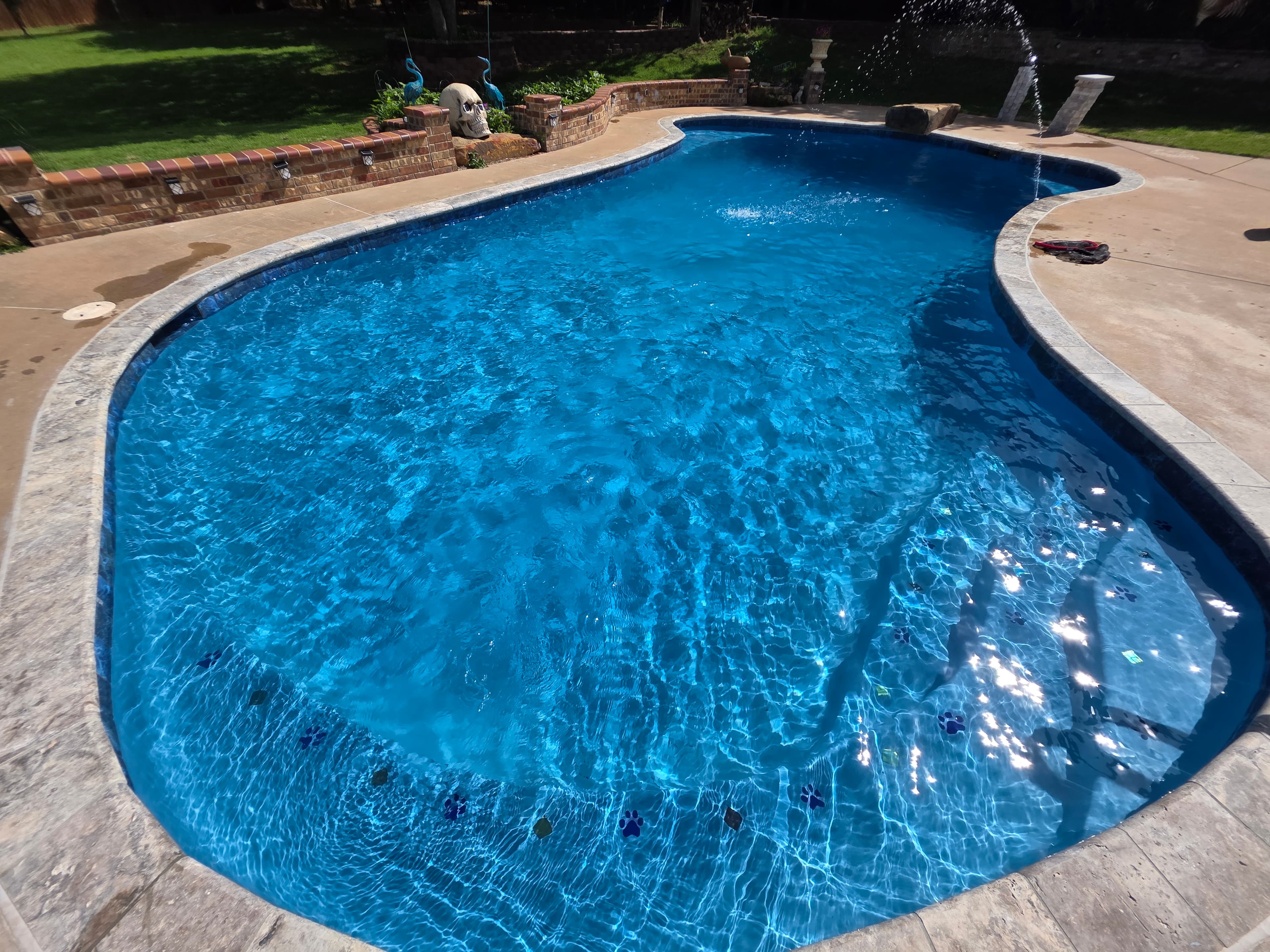Beautifully remodeled pool with fountain feature and new plaster
