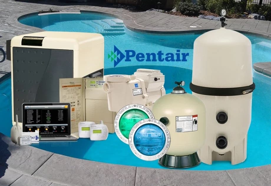Pool equipment including filters, pumps, and lighting from Pentair, displayed in front of a swimming pool.